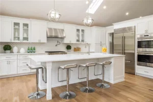 Custom white shaker kitchen designed by Kitchens by Frankie in Westchester