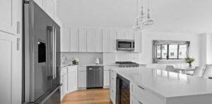 Custom white shaker kitchen designed in NYC by Kitchens by Frankie in Westchester