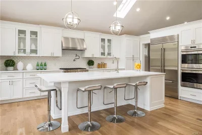 Custom white shaker kitchen designed by Kitchens by Frankie in Westchester